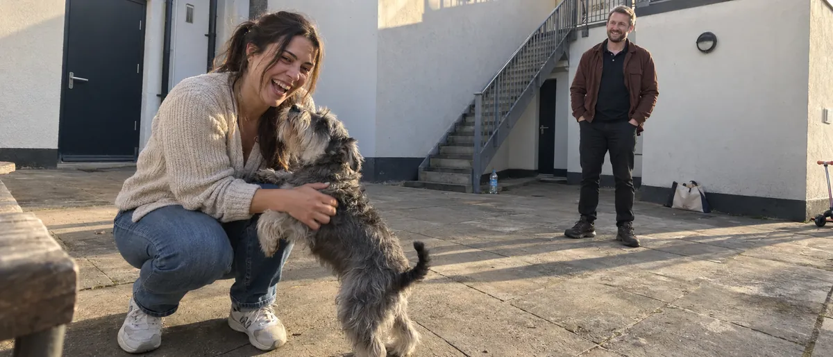 pet owner reunited with miniature schnauzer - Illustrative Image
